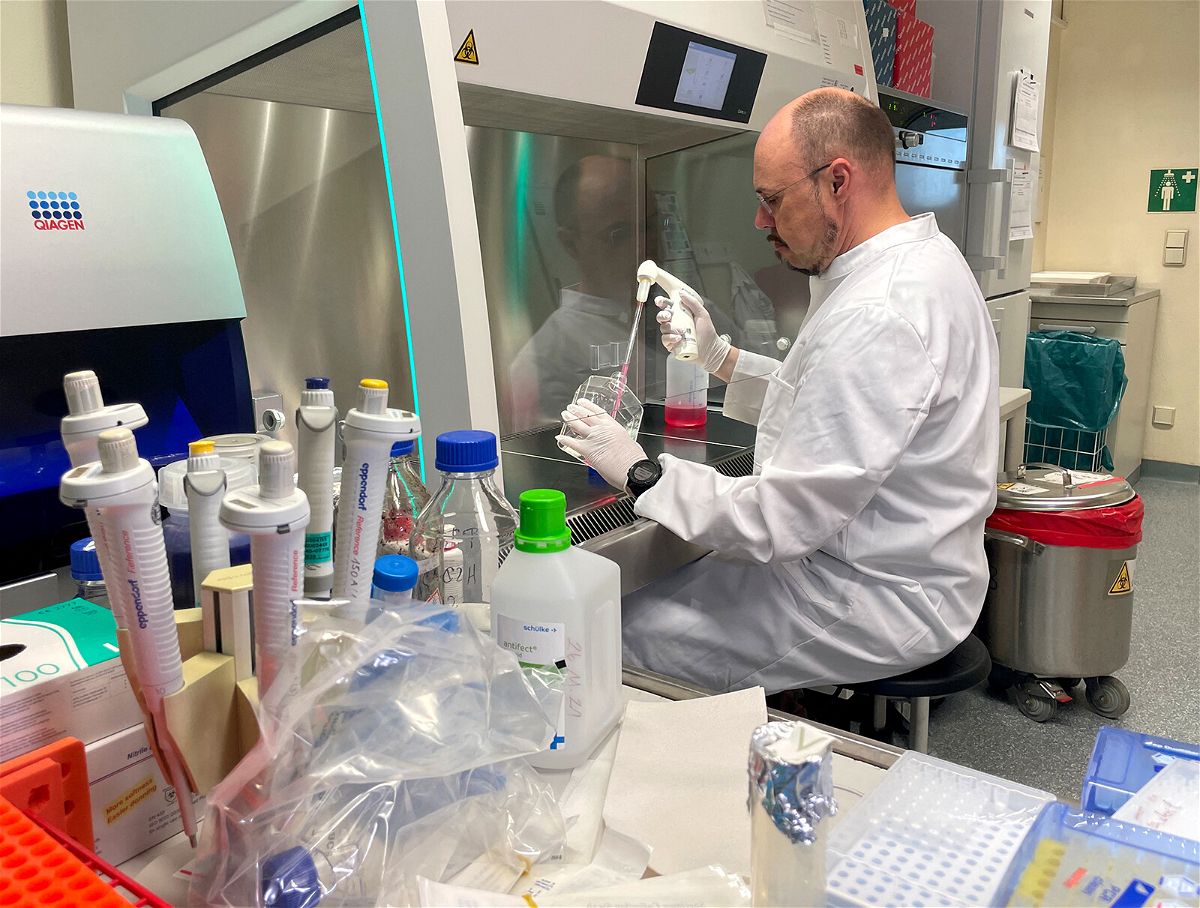 <i>Christine Uyanik/Reuters</i><br/>Head of the Institute of Microbiology of the German Armed Forces Roman Woelfel works in his laboratory in Munich on May 20 after Germany detected its first case of monkeypox.