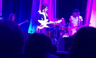 Johnny Depp joins musician Jeff Beck on stage during a concert in England on May 29.