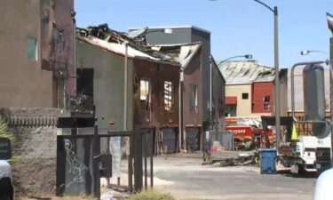 Las Vegas Fire and Rescue officials say between 20 and 40 personnel were digging in debris at 200 Tower Street Monday for a cause in a large early Sunday morning fire.