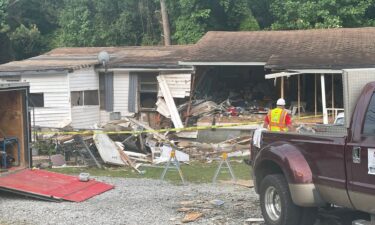 A woman is dead and two others are injured after a teen crashed into their Coweta County home amid a police chase