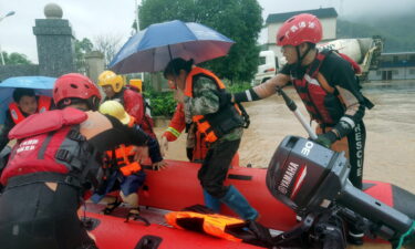 Parts of southern China were hit by the heaviest downpours in 60 years over the weekend