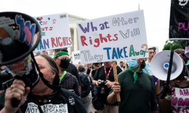 Abortion rights advocates react to the Supreme Court overturning Roe v. Wade outside of the US Supreme Court in Washington