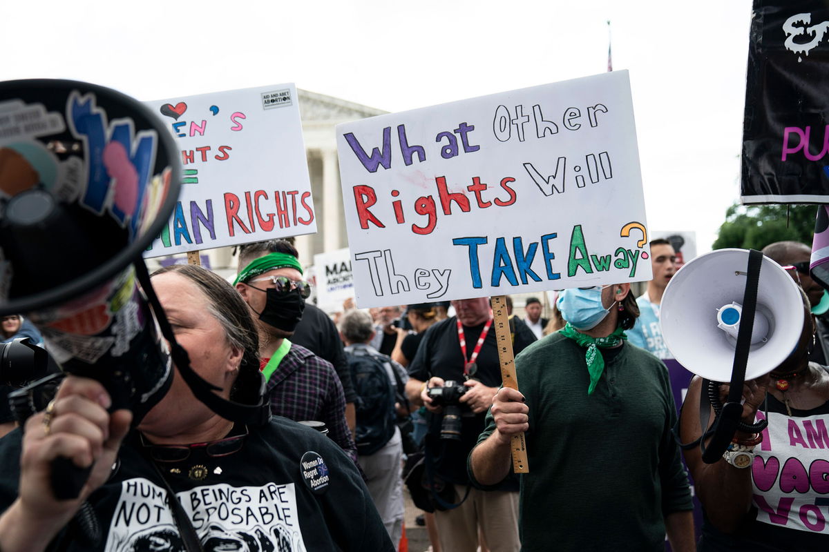 <i>Sarah Silbiger for CNN</i><br/>Abortion rights advocates react to the Supreme Court overturning Roe v. Wade outside of the US Supreme Court in Washington