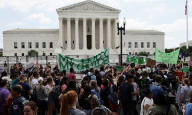 Abortion rights demonstrators protest outside the United States Supreme Court as the court announced its ruling to overturn the landmark Roe v Wade abortion decision.