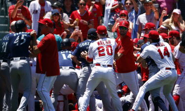 Major League Baseball has suspended 12 players and coaches following the mass brawl that marred the Los Angeles Angels' win over the Seattle Mariners on June 26.