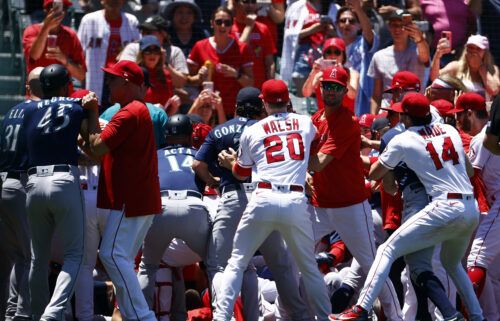 Major League Baseball has suspended 12 players and coaches following the mass brawl that marred the Los Angeles Angels' win over the Seattle Mariners on June 26.
