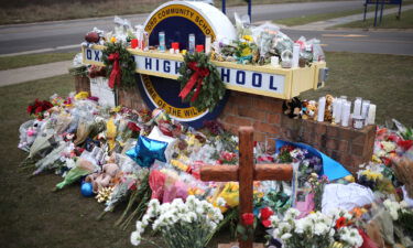 A memorial outside Oxford High School last year to the shooting victims killed on November 30