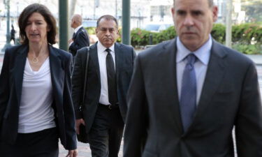 Former Theranos COO Ramesh "Sunny" Balwani (C) arrives at the Robert F. Peckham U.S. Federal Courthouse on June 21 in San Jose