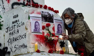 Chileans call for justice at a vigil for the late journalist Francisca Sandoval in Santiago on May 13.