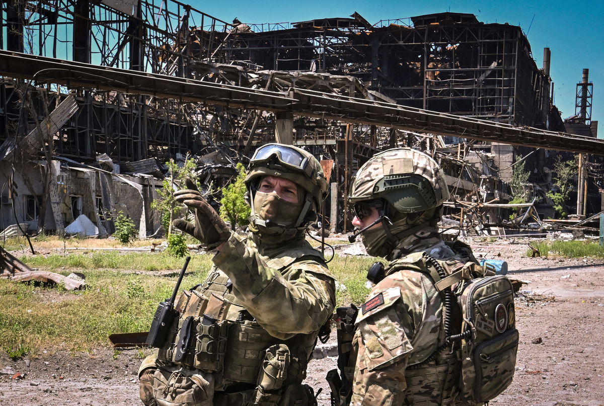 <i>Yuri Kadobnov/AFP/Getty Images</i><br/>Russian servicemen guard an area of the Azovstal steel plant in Mariupol on June 13