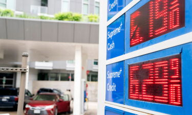 Gas prices are displayed on a sign in Washington