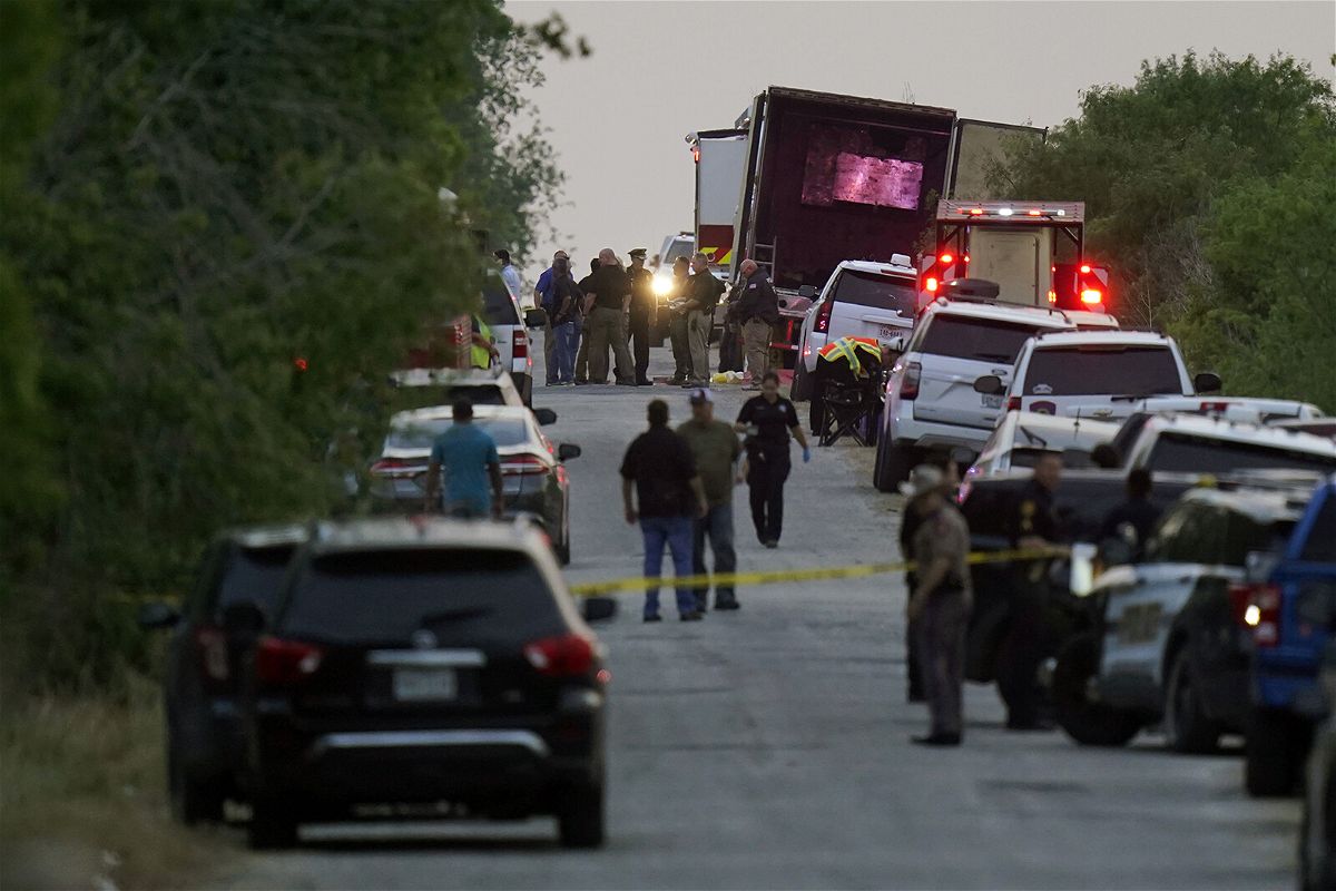 <i>Eric Gay/AP</i><br/>Police and other first responders work the scene where officials say dozens of people were found dead in San Antonio.