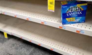 A box of Tampax Pearl tampons are seen on a shelf at a store in Washington