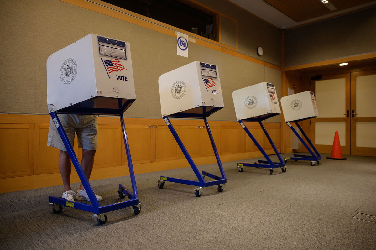 <i>Ed Jones/AFP/Getty Images</i><br/>A New York judge strikes down NYC law granting voting rights to noncitizens. Pictured is a voting station at the Metropolitan Museum of Art (MET) during the mayoral election process in New York on June 12