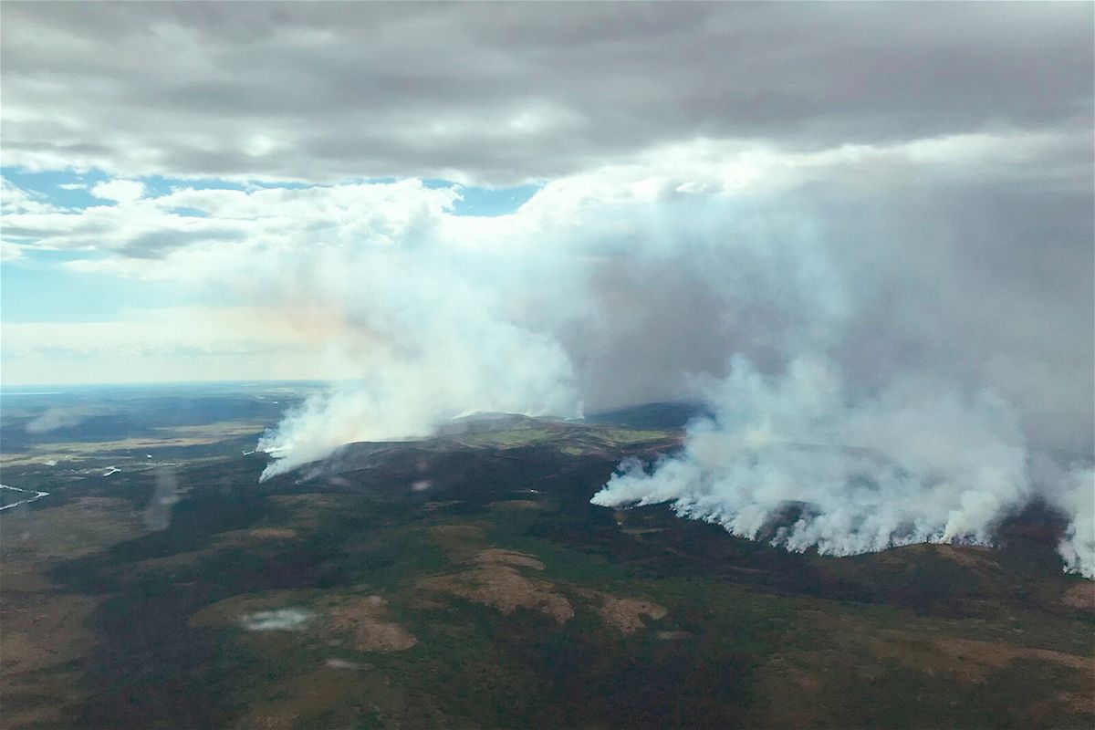 <i>BLM Alaska Fire Service/AP/FILE</i><br/>The East Fork Fire burns through the southern Alaskan Tundra near St. Mary's on June 9. Anchorage is experiencing its second-warmest June