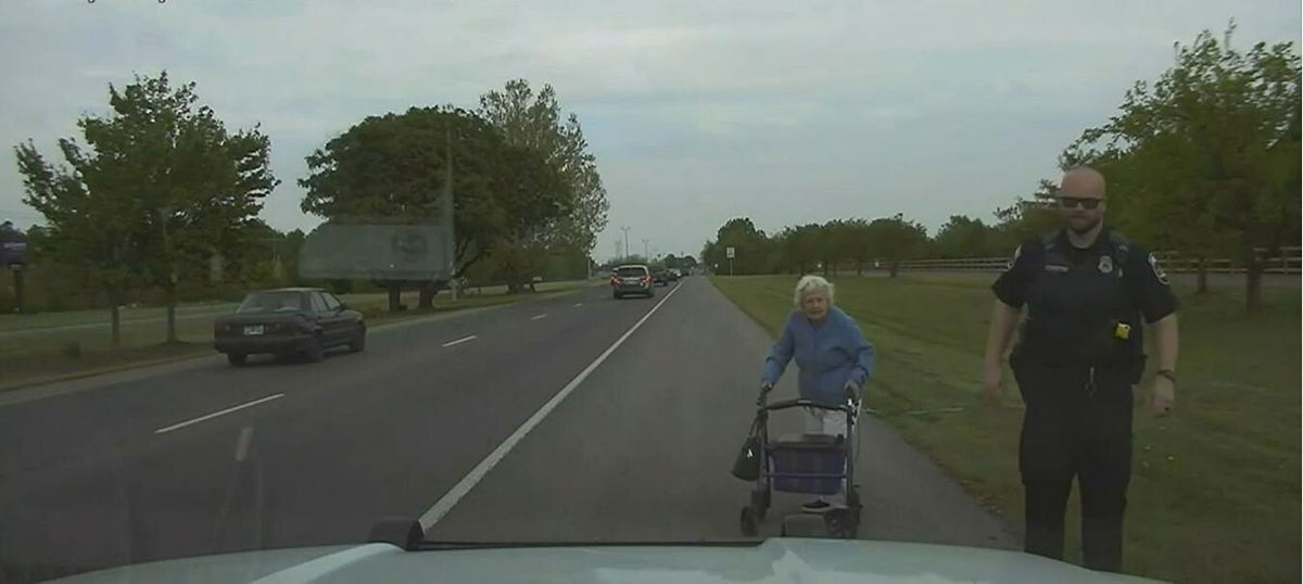 <i>Murfreesboro police/WSMV</i><br/>Tennessee Police officer helps 84-year-old get to her hair appointment.