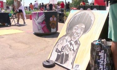 Art and color now fill the liquor store parking lot at one of north Minneapolis' most trafficked intersections. It's part of a plan to bring color