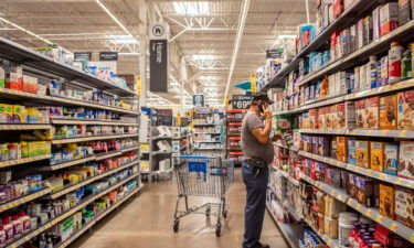 A customer shops for nutrition products in a Walmart Supercenter on July 8 in Houston