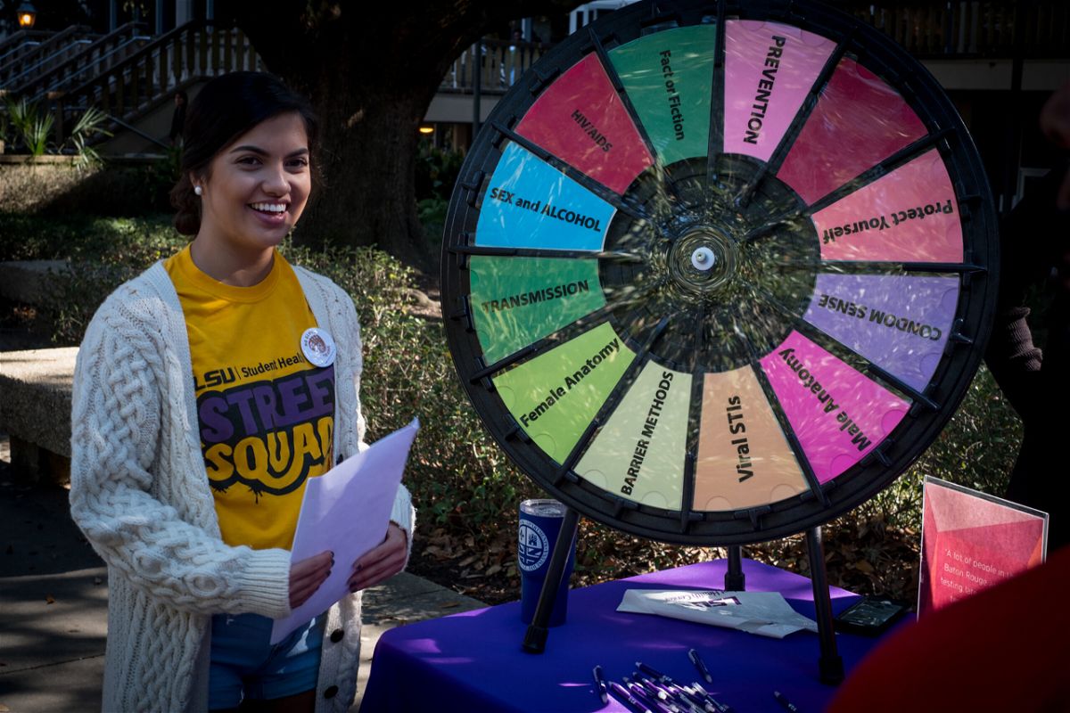 <i>Nina Robinson/The Verbatim Agency/Getty Images</i><br/>A Louisiana State University Street Squad peer educator shares information about safe sex practices with fellow students.