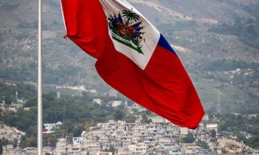 The Haitian flag waves over the Champ de Mars in Port-au-Prince