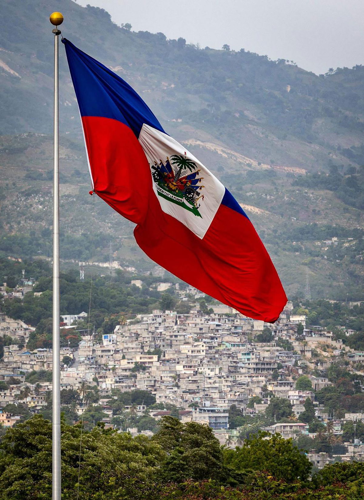 <i>Jose A. Iglesias/El Nuevo Herald/Tribune News Service/Getty Images</i><br/>The Haitian flag waves over the Champ de Mars in Port-au-Prince