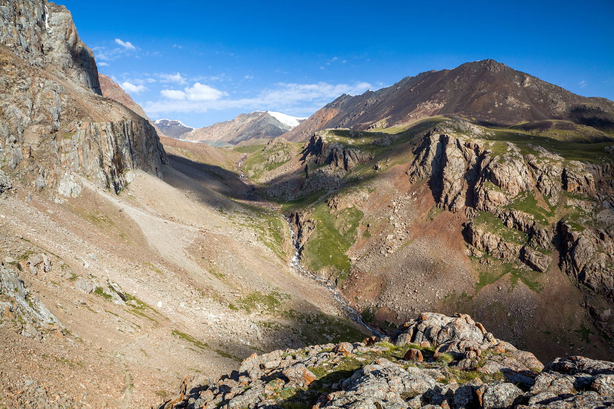 <i>Evgeny_D/iStockphoto/Getty Images</i><br/>A group of tourists trekking in Kyrgyzstan's Tian Shan mountains on Friday survived a huge avalanche that swept right over them. Pictured are the Tien Shan mountains in Kyrgyzstan.