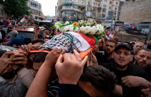 US says Israeli military gunfire is likely responsible for Shireen Abu Akleh's death but examination of the bullet is inconclusive. Palestinian mourners carry the body of Abu Akleh in the West Bank city of Ramallah