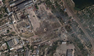 This satellite image from Planet Labs PBC shows the aftermath of a Ukrainian strike on what it said was a Russian ammunition depot in Nova Kakhovka.