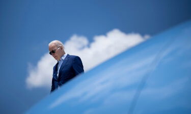 US President Joe Biden disembarks Air Force One at T.F. Green International Airport in Warwick