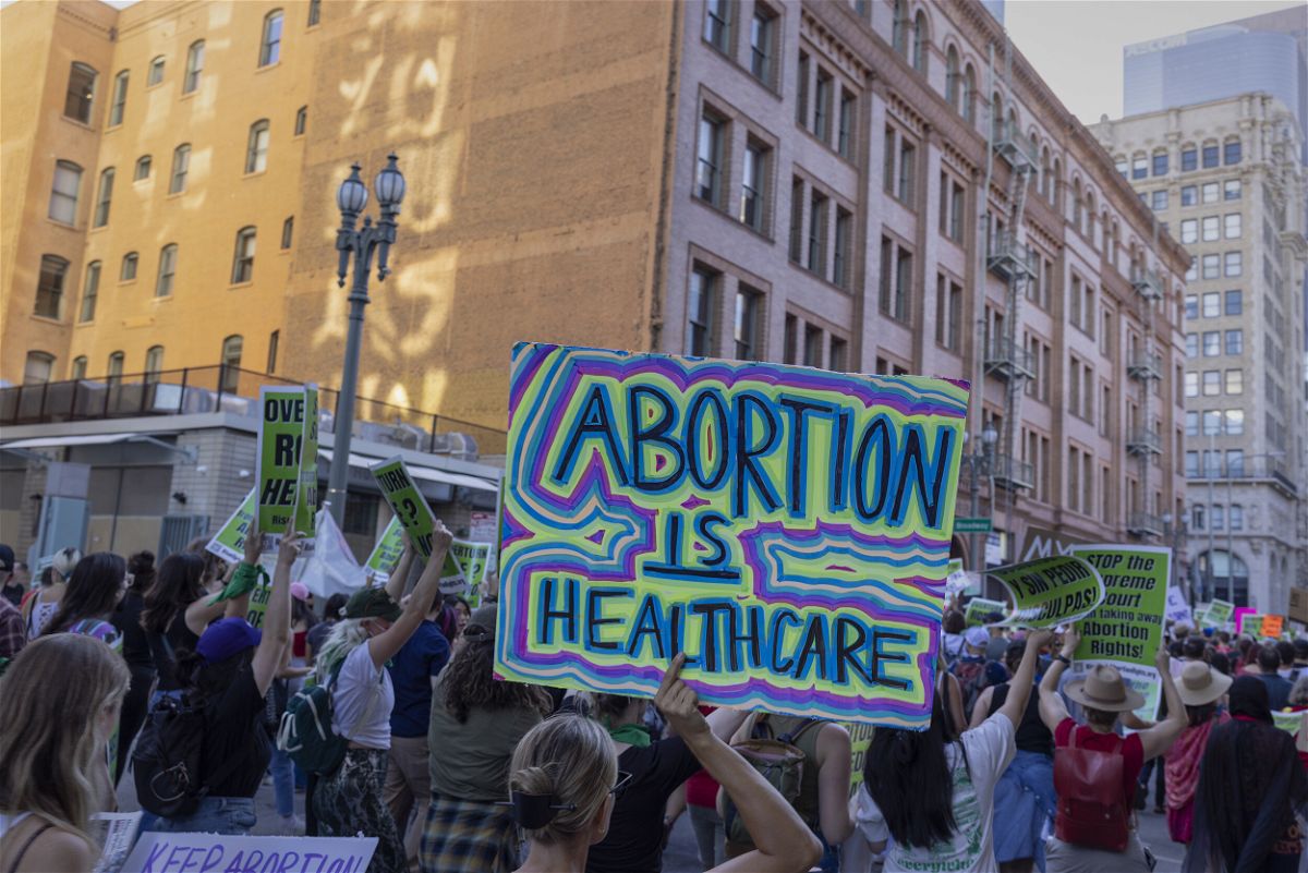 <i>David McNew/Getty Images</i><br/>Doctors and nurses turned to TikTok to offer abortion help. Protesters here gather in reaction to the Dobbs v. Jackson Women's Health Organization ruling on June 24