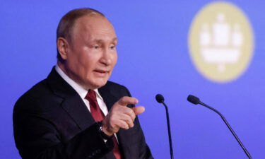 Russian President Vladimir Putin delivers a speech during a session of the St. Petersburg International Economic Forum (SPIEF) in Saint Petersburg