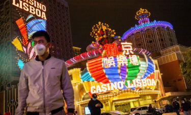 Macao's casinos have been bleeding hundreds of millions of dollars a month during the pandemic. Now a prolonged lockdown is adding more uncertainty for players in the world's largest gambling hub.