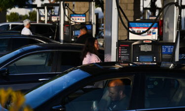 Consumer expectations for prices to continue rising over the next year increased to the highest level on record. Pictured is a gas station outside a Costco Wholesale Corp. store on June 14