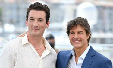 Miles Teller and Tom Cruise at the 'Top Gun: Maverick' premiere in May.