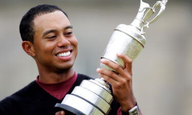 Tiger Woods celebrates after his second Open win at St. Andrews in 2005.