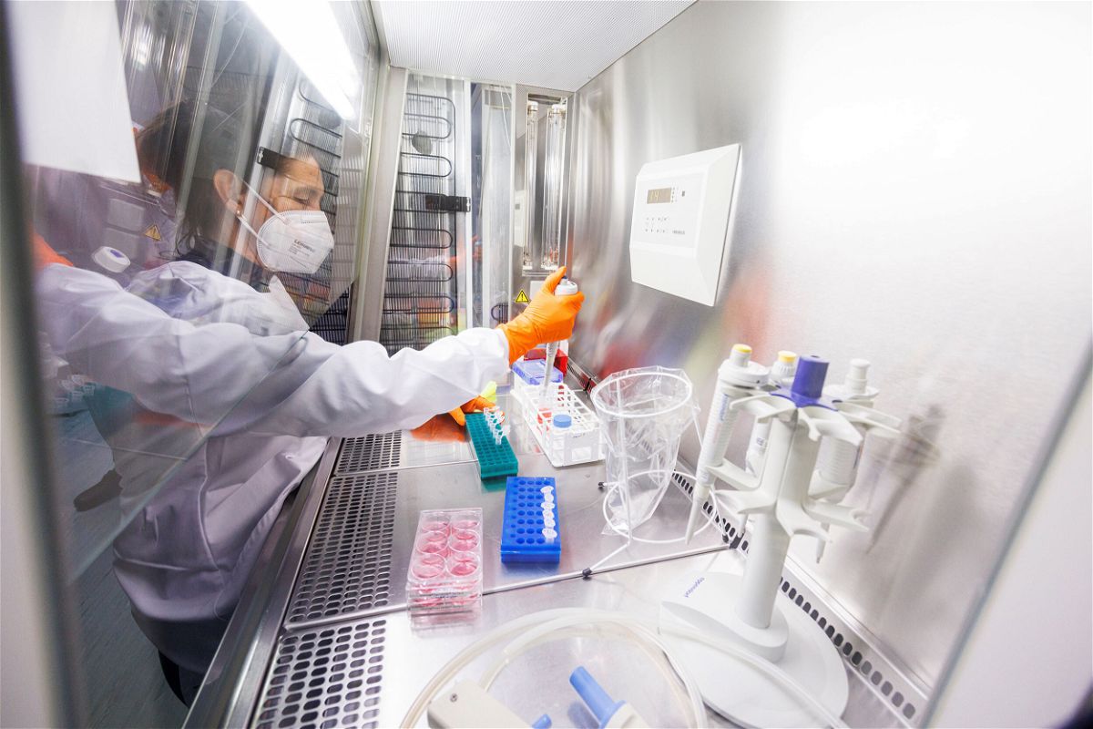 <i>Lukas Barth/Reuters</i><br/>An employee works on a vaccine based on the monkeypox vaccine that has already been developed by the vaccine company Bavarian Nordic at a laboratory of the company in Martinsried near Munich