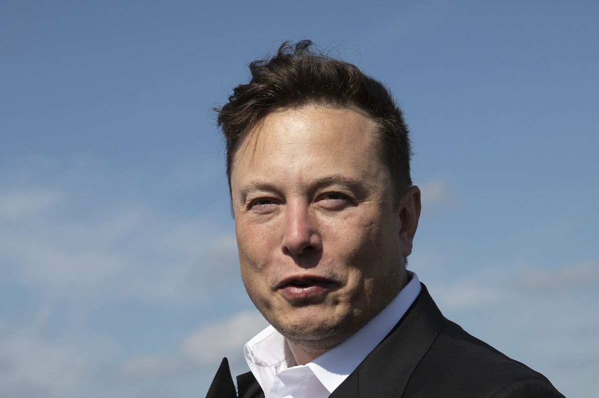 <i>Maja Hitij/Getty Images</i><br/>Tesla head Elon Musk talks to the press as he arrives to have a look at the construction site of the new Tesla Gigafactory near Berlin on September 03