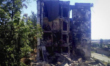 Damaged residential buildings are seen in Lysychansk