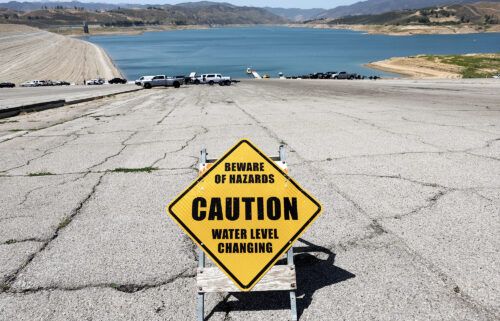 A caution sign is posted at the Castaic Lake reservoir in Los Angeles County on May 3