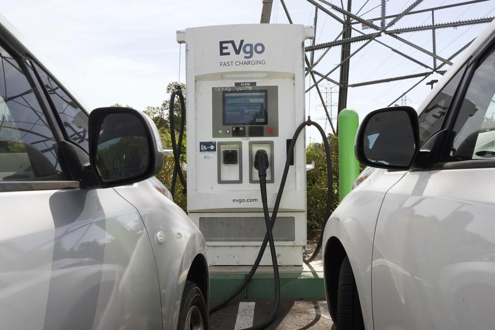 Electric cars are parked at a charging station in Sacramento, Calif., on April 13, 2022. California is poised to require 100% of new cars, trucks and SUVs sold in the state to be powered by electricity or hydrogen by 2035, a groundbreaking climate policy likely to reshape the U.S. car market by speeding the transition to electric vehicles. The California Air Resources Board will vote Thursday, Aug. 25, 2022, on the policy, which would set the nation’s most aggressive mandates for transitioning to electric vehicles.