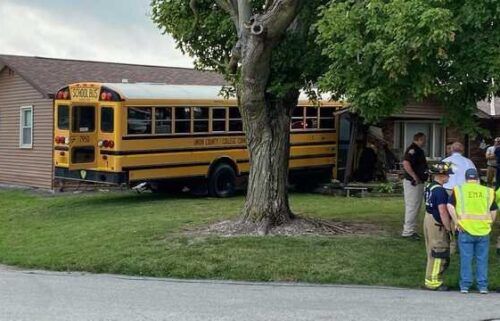A school bus driver was taken to the hospital after a school bus carrying 32 students crashed into a home near College Corner Union Elementary in College Corner.