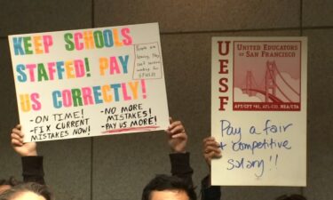 A group of teachers from the United Educators of San Francisco gathered ahead of a school board meeting to call on the district to begin negotiations with them