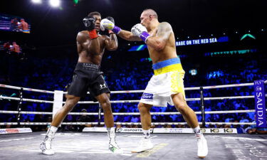 Oleksandr Usyk punches Anthony Joshua during their World Heavyweight Championship fight during the Rage on the Red Sea Heavyweight Title Fight in Jeddah.