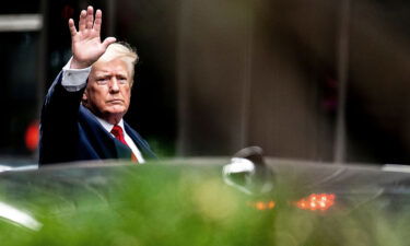 Former President Donald Trump waves as he departs Trump Tower on August 10 in New York. The Justice Department issued a new subpoena to the National Archives for more January 6 documents.