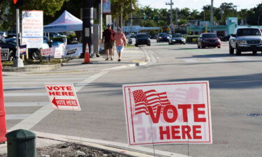 Voting signs are seen displayed on August 23