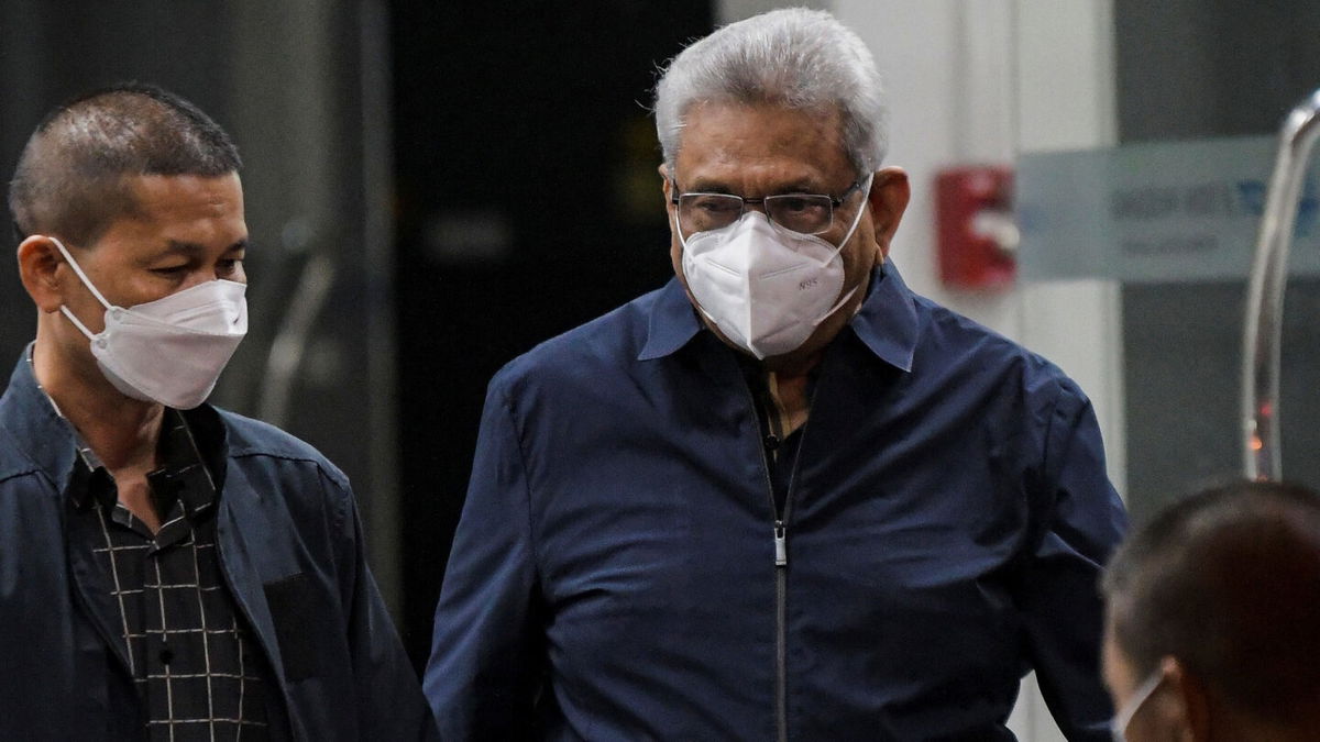 <i>Tananchai Keawsowattana/Reuters</i><br/>Former Sri Lankan president Gotabaya Rajapaksa arrives at Bangkok's Don Mueang International airport on August 11.