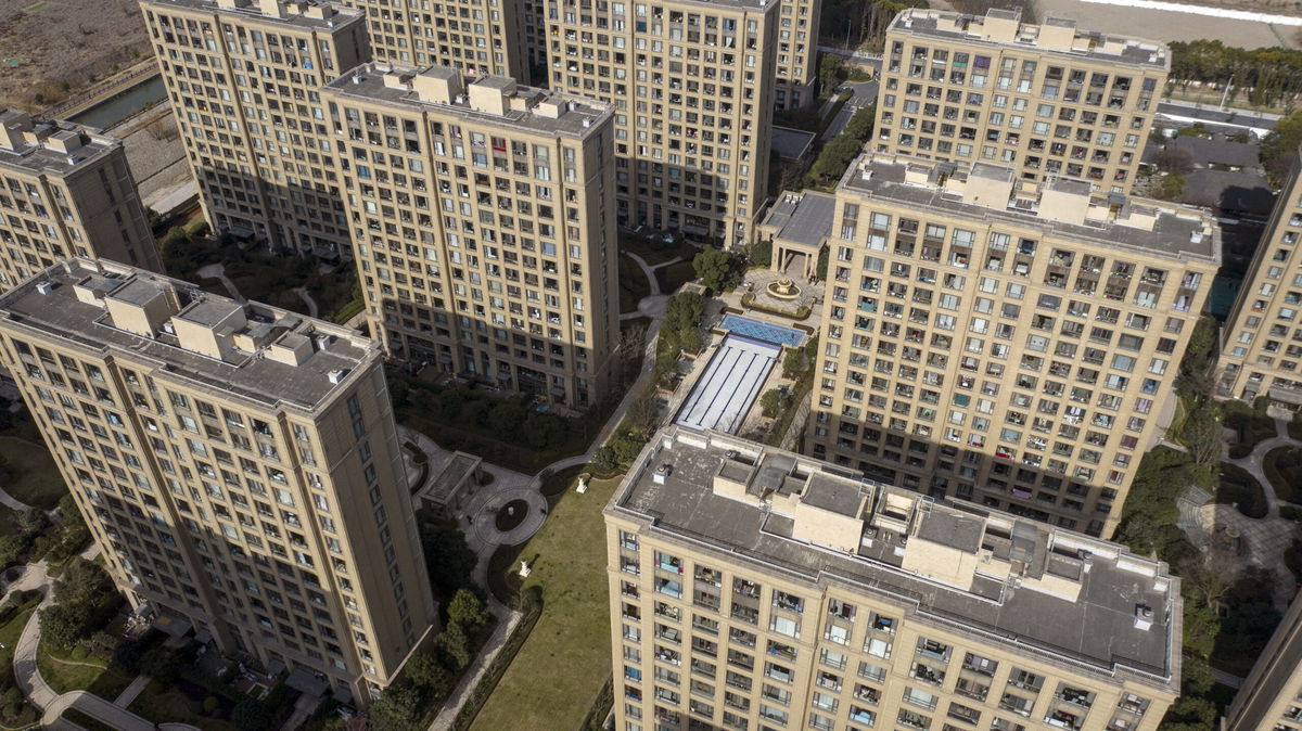 <i>Qilai Shen/Bloomberg/Getty Images</i><br/>China slashes mortgage rates to tackle the deepening property crisis. Pictured are apartment buildings at the Magnolia Mansion residential project in Shanghai