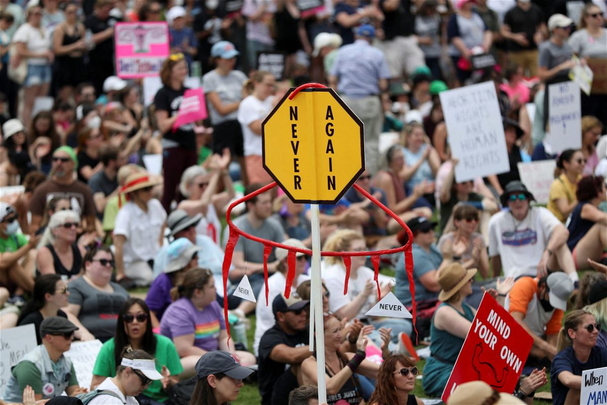 <i>Alyssa Pointer/Reuters</i><br/>A homemade sign resembling a cloth hanger is seen as abortion rights protesters participate in nationwide demonstrations following the leaked Supreme Court opinion suggesting the possibility of overturning the Roe v. Wade abortion rights decision