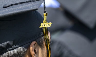 Students listen during Magnolia High School's commencement at Handel Stadium in Anaheim