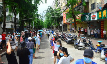 People line up for nucleic acid testing in Sanya